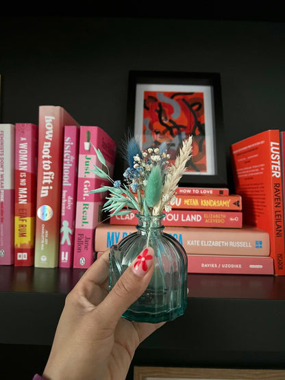 Handmade 'Baby Boy' card with dried flowers arranged in a removable slot. The flowers can be taken out and placed in a small vase, creating a lasting keepsake to celebrate the arrival of a baby boy.