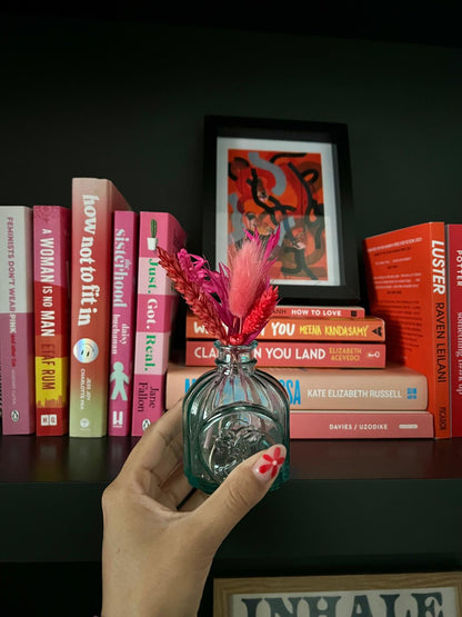 Handmade 'I Love You' card with dried flowers arranged in a removable slot. The flowers can be taken out and placed in a small vase, making it a lasting and thoughtful keepsake.