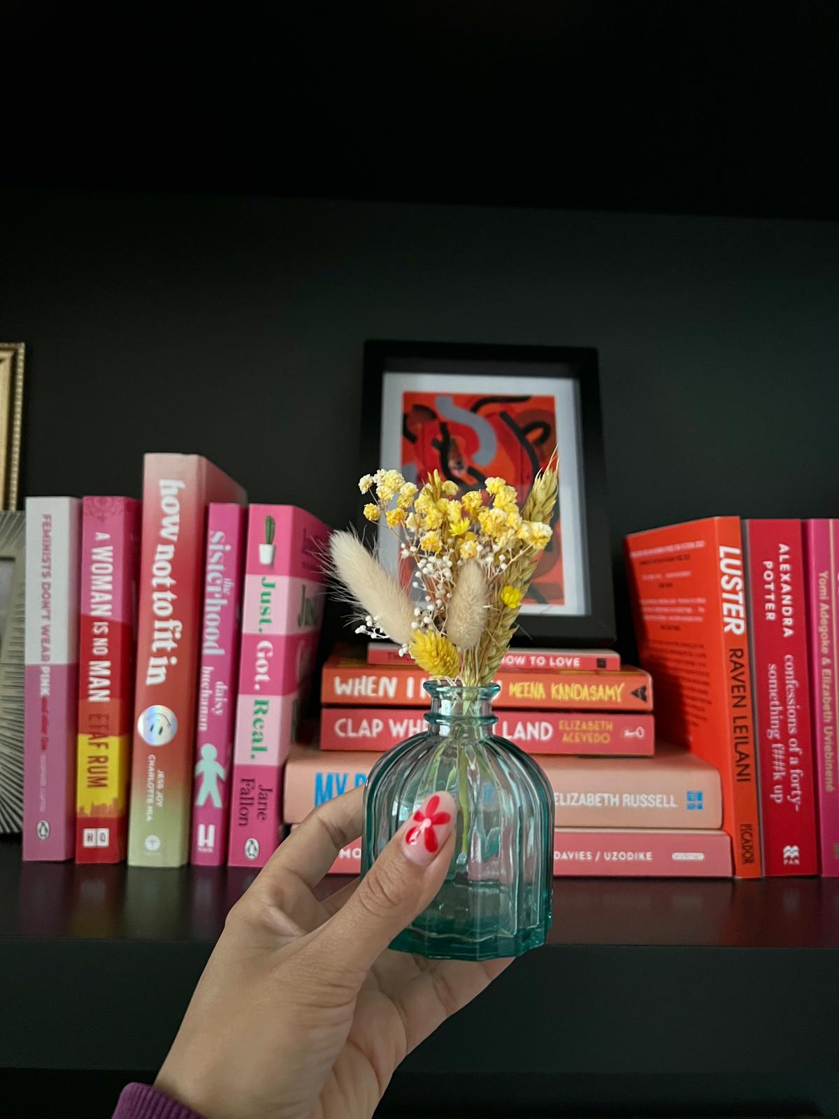 Handmade 'Thinking of You' card with dried flowers arranged in a removable slot. The flowers can be taken out and placed in a small vase, creating a lasting keepsake of care and thoughtfulness.